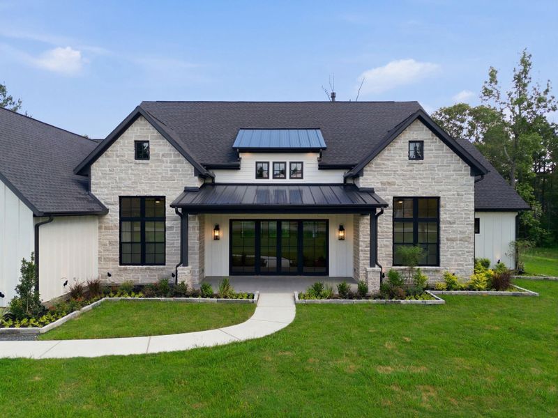Front exterior of a new home in , Montgomery, TX, highlighting curb appeal (Image 26).