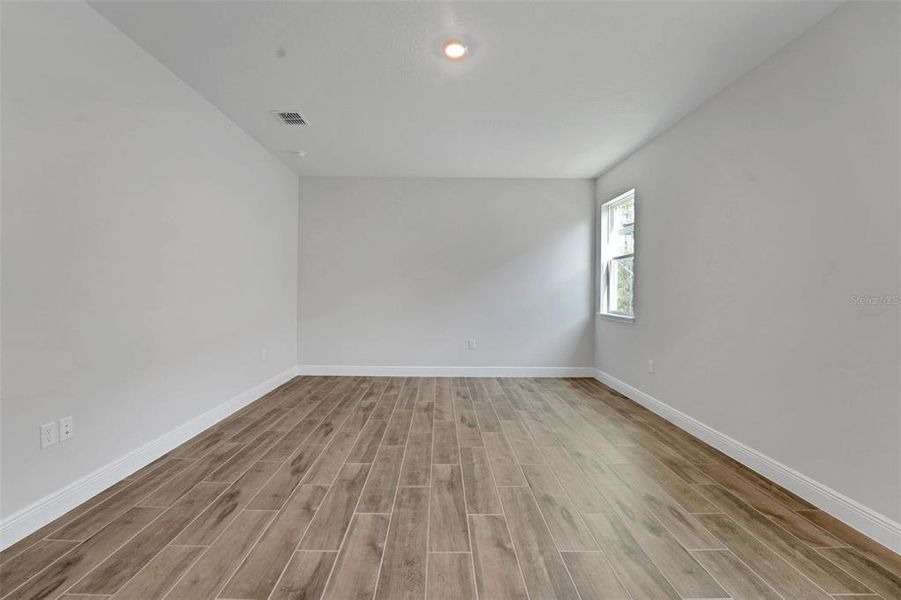 Spacious, unfurnished interior of a new home in Palms at Windermere, Windermere (Image 27).