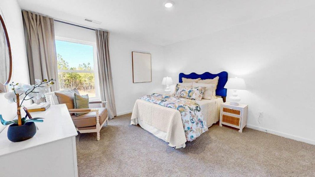 Furnished interior view inside a new home in Magnolia at the Bluffs Phase 3, Freeport (Image 13).