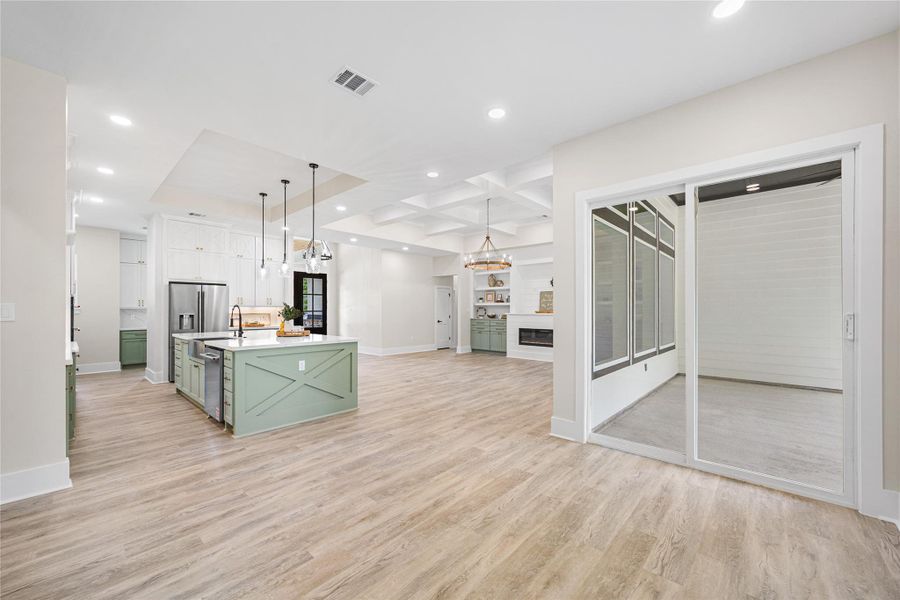 Formal Dining with Glass Sliding Door leads You onto a Huge Back Patio, Featuring Two Seating Areas and Plumbed with Everything You Need to Design Your Own Outdoor Entertainer's Kitchen.