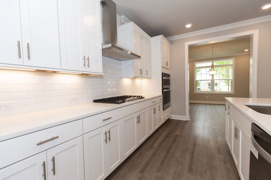 Representative furnished interior of a home built from the The Charleston by The Providence Group in Aberdeen, Hoschton (Image 11).