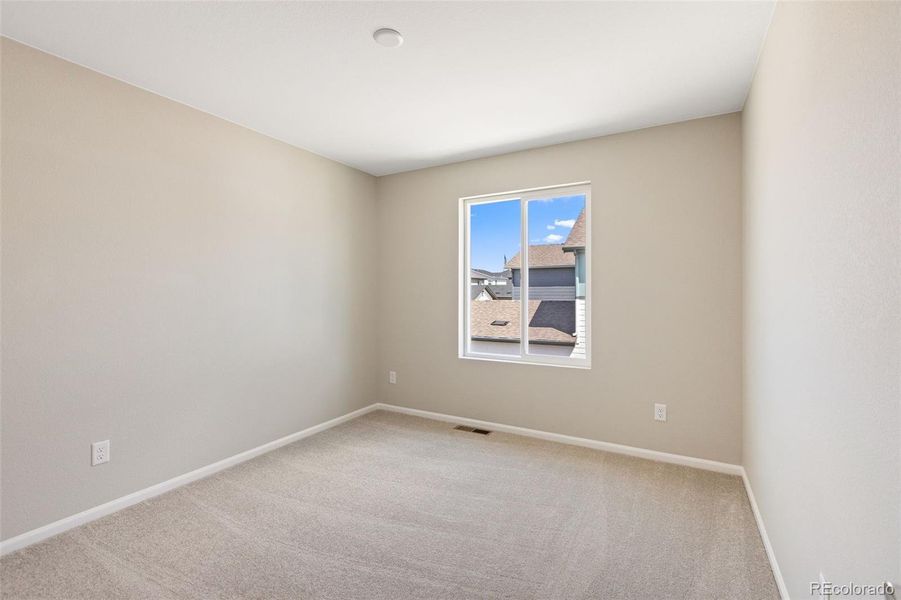 Spacious, unfurnished interior of a new home in Woodrose at Painted Prairie, Aurora (Image 29).