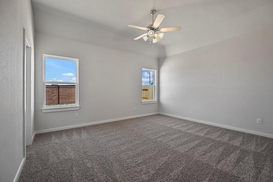 Spacious, unfurnished interior of a new home in Sunterra, Katy (Image 14).