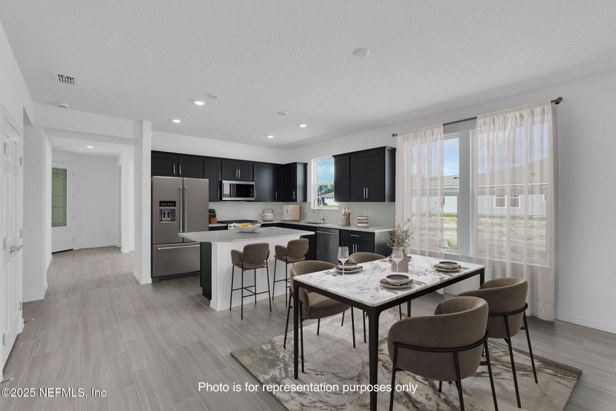 Furnished interior view inside a new home in Del Webb Wildlight, Yulee (Image 7).