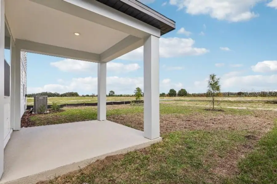 Exterior details and patio area of a home in Trailside, Mount Dora (Image 4).