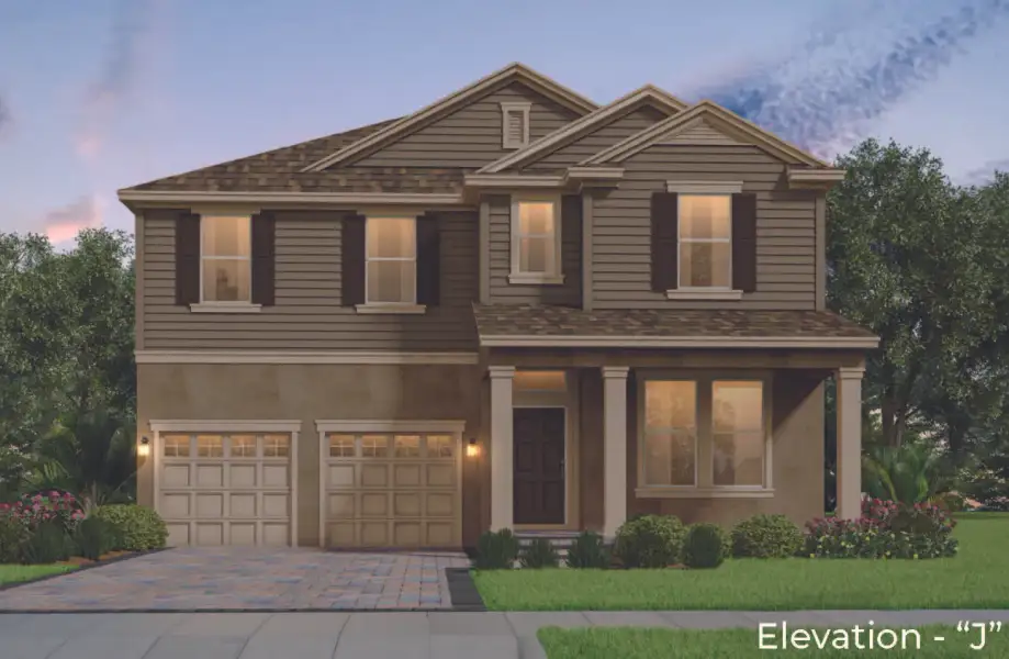 Front exterior of a new home in Waterleigh, Winter Garden, FL, highlighting curb appeal (Image 2).