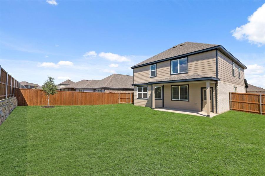 Exterior details and patio area of a home in Burgess Meadows, Cleburne (Image 3). Exterior details and patio area of a home in Burgess Meadows, Cleburne (Image 3).