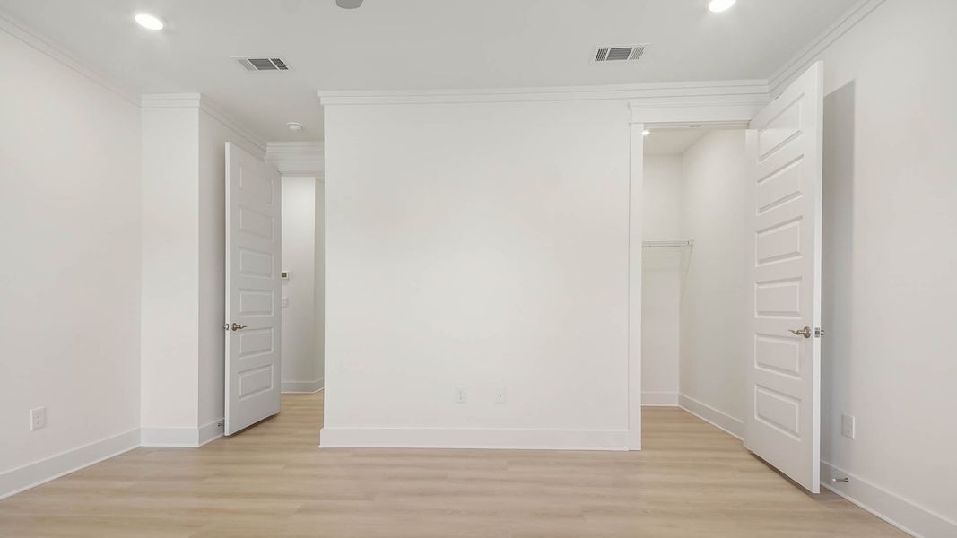 Representative unfurnished interior of a home built from the Trenton by D.R. Horton in Parkside, Santa Rosa Beach (Image 37).