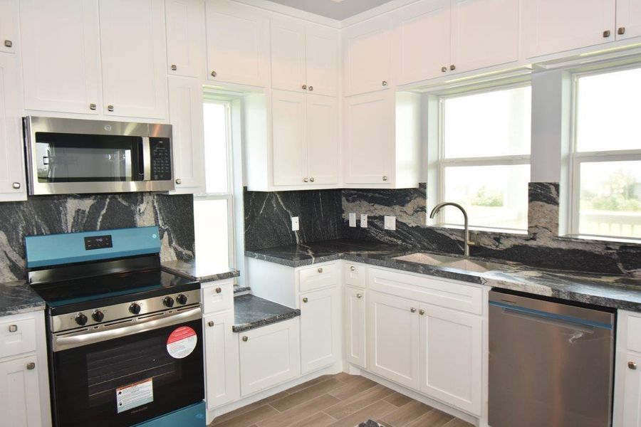 Furnished interior view inside a new home in , Galveston (Image 8). Furnished interior view inside a new home in , Galveston (Image 8).