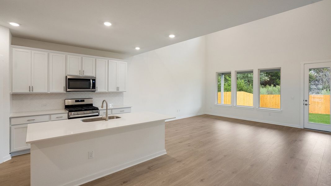 Furnished interior view inside a new home in Prairie Oaks, Oak Point (Image 5).