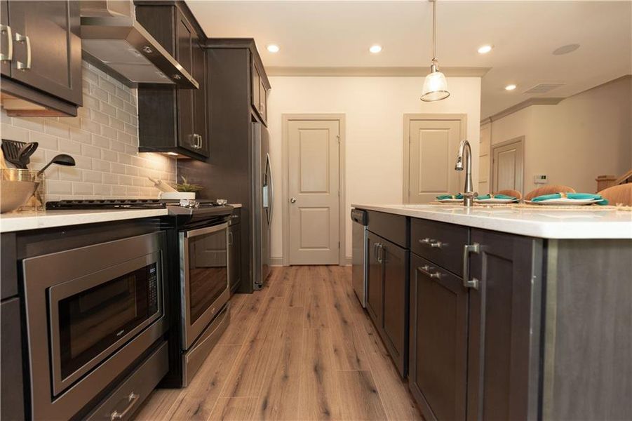 Furnished interior view inside a new home in Waterhaven Single Family, Cumming (Image 24).