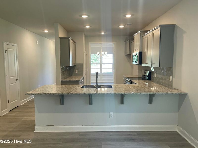 Furnished interior view inside a new home in Mill Creek Cove, Bolivia (Image 8). Furnished interior view inside a new home in Mill Creek Cove, Bolivia (Image 8).