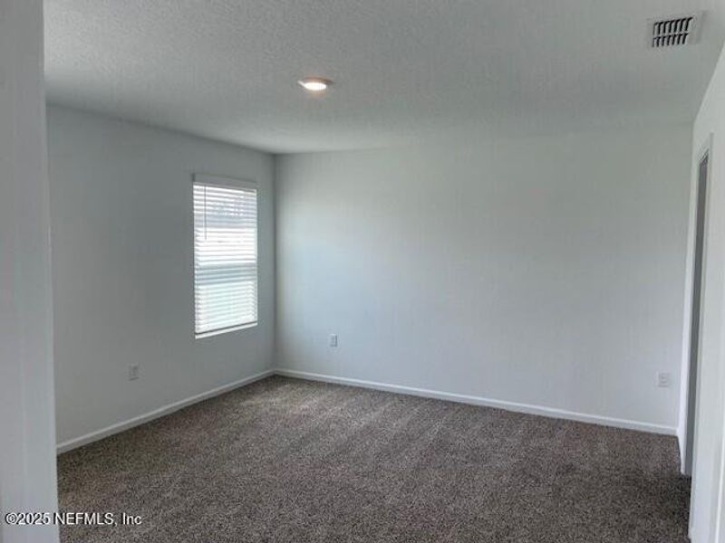 Spacious, unfurnished interior of a new home in The Arbors, Jacksonville (Image 17).