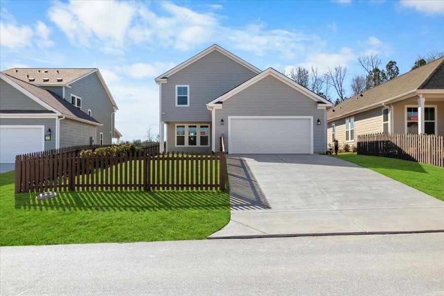 Front exterior of a new home in Tillery Park, Grovetown, GA, highlighting curb appeal (Image 23). Front exterior of a new home in Tillery Park, Grovetown, GA, highlighting curb appeal (Image 23).