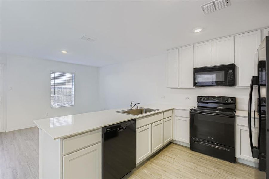 Furnished interior view inside a new home in Tillage Farms: Wellton Haven, Princeton (Image 7).