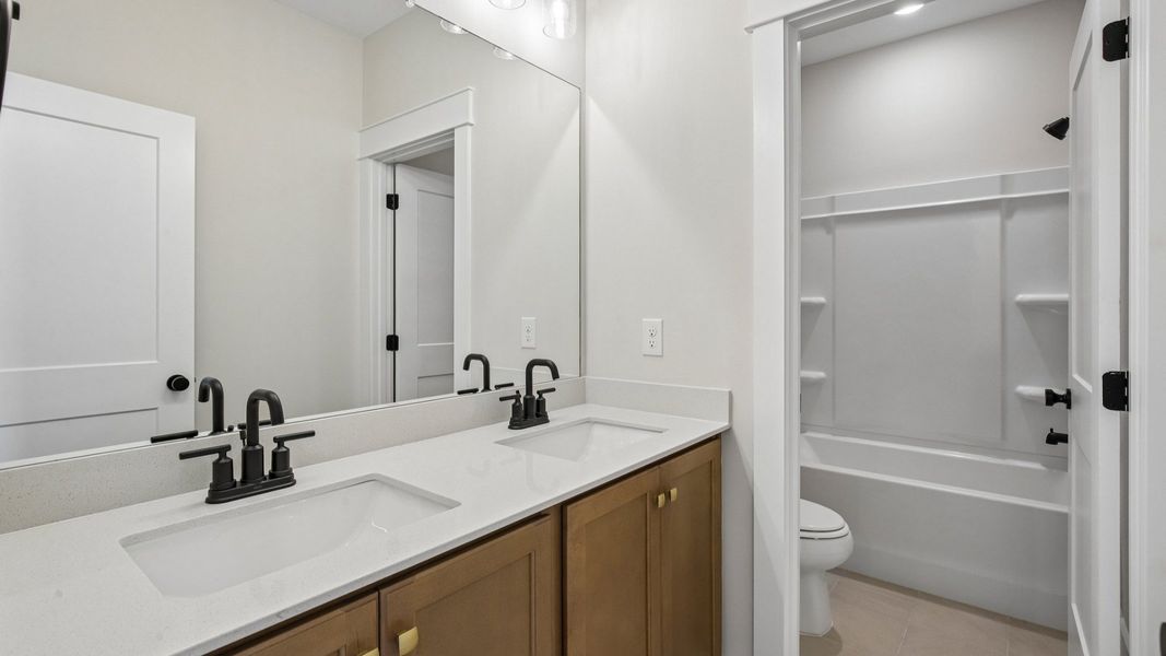 Bathroom with dual vanity Bathroom with dual vanity