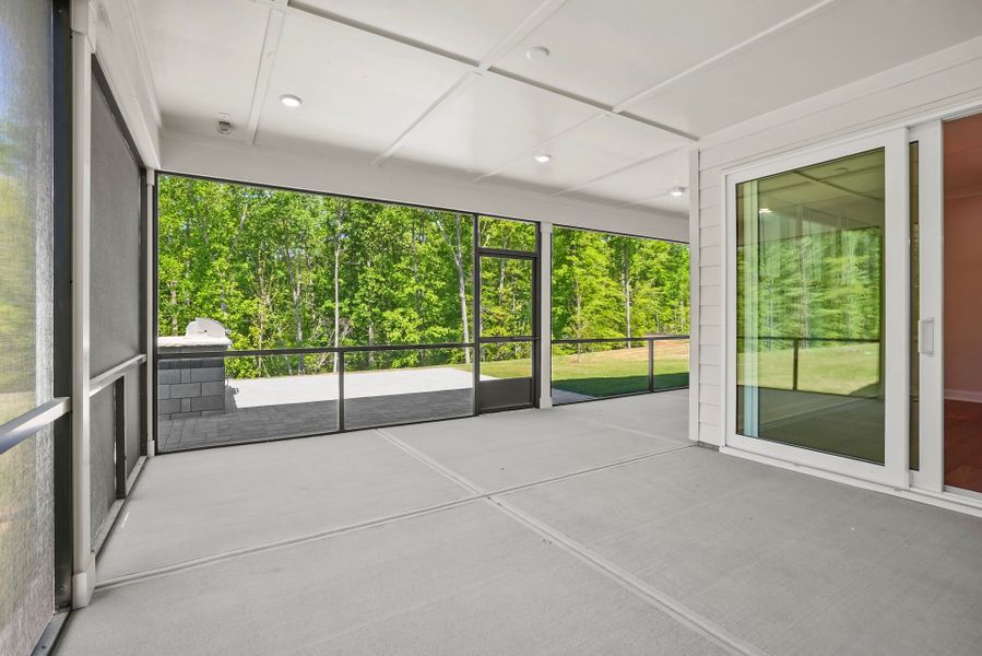 Exterior details and patio area of a home in Carolina Riverside, Belmont (Image 36).