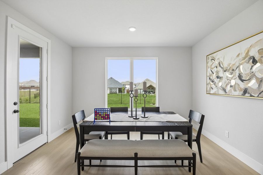 Representative furnished interior of a home built from the The Milan by Lillian Custom Homes in Polo Ridge, Forney (Image 18).