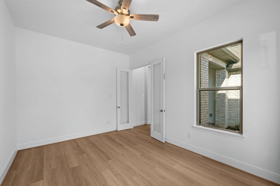 Spacious, unfurnished interior of a new home in Dunham Pointe 70', Cypress (Image 28).