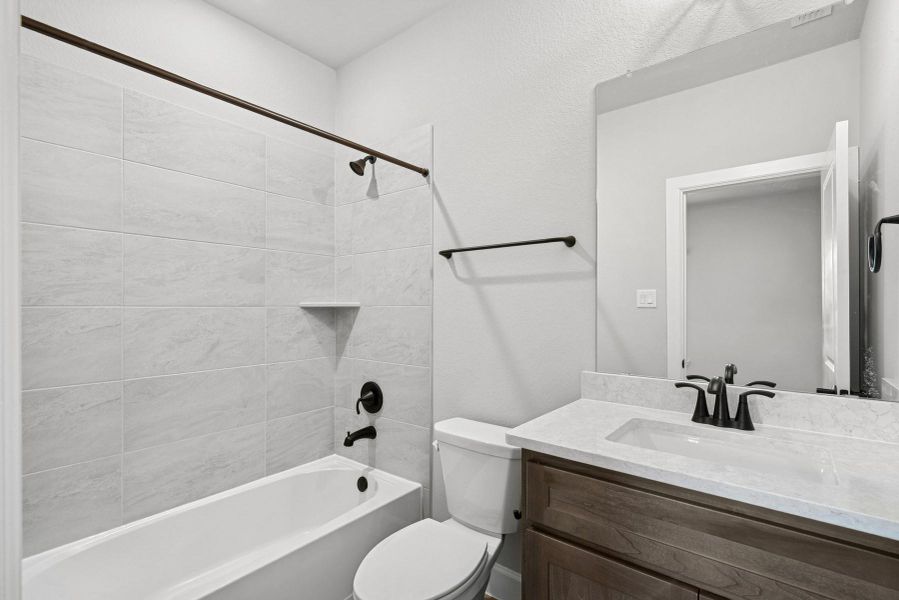 Furnished interior view inside a new home in Harvest Green 45', Richmond (Image 4).