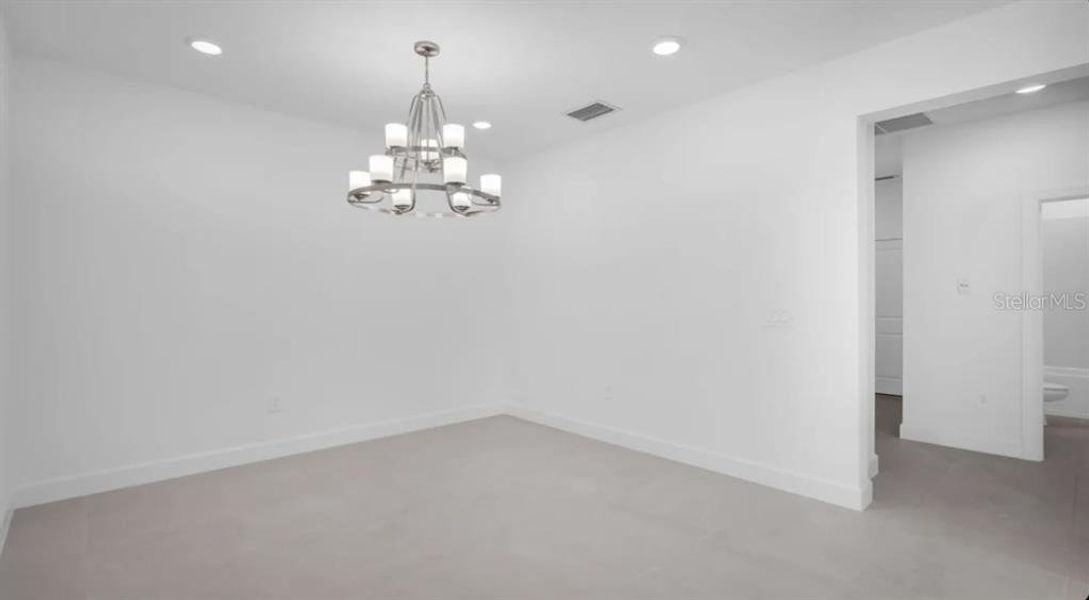 Spacious, unfurnished interior of a new home in The Cove at West Port, Port Charlotte (Image 13).