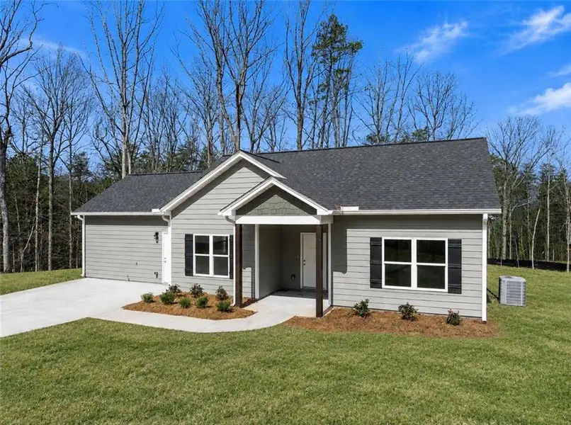 Front exterior of a new home in , Cleveland, GA, highlighting curb appeal (Image 2). Front exterior of a new home in , Cleveland, GA, highlighting curb appeal (Image 2).