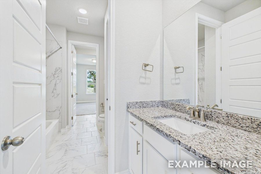 Furnished interior view inside a new home in Potranco Oaks, Castroville (Image 17).
