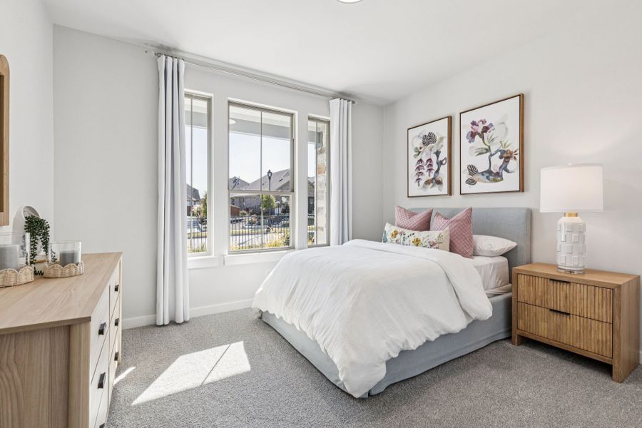 Bedroom in the Oscar home plan by Trophy Signature Homes – REPRESENTATIVE PHOTO