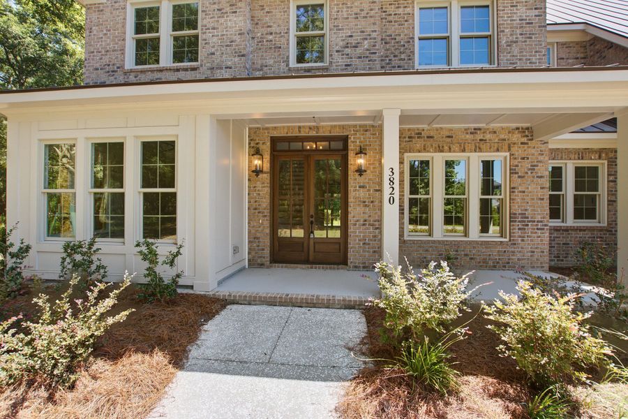 Exterior details and patio area of a home in , Johns Island (Image 30).
