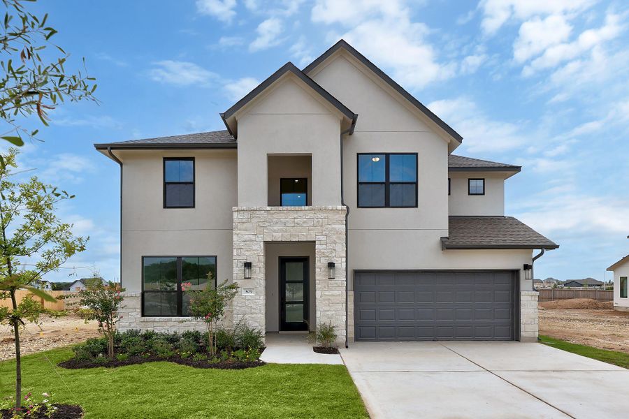 Front exterior of a new home in Nolina, Georgetown, TX, highlighting curb appeal (Image 2). Front exterior of a new home in Nolina, Georgetown, TX, highlighting curb appeal (Image 2).