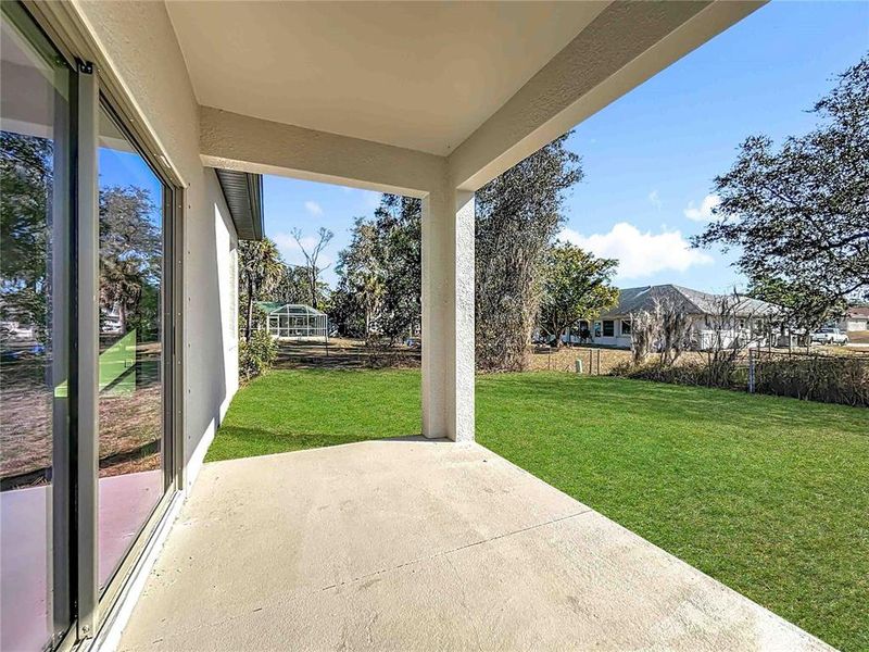 Exterior details and patio area of a home in , North Port (Image 25).