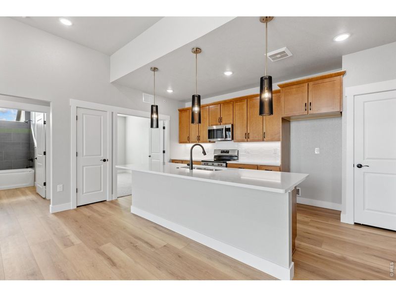 Furnished interior view inside a new home in Northfield at Old Town - Vista Collection, Fort Collins (Image 6).