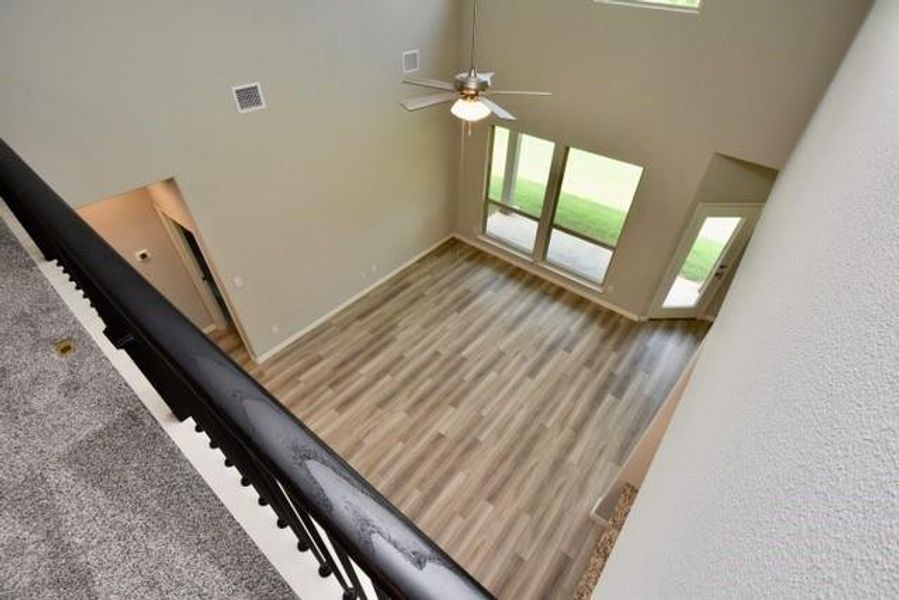 Upstairs secondary living area is open to the family room