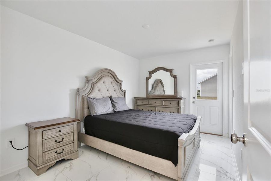 Furnished interior view inside a new home in Peace Creek Reserve, Winter Haven (Image 17).