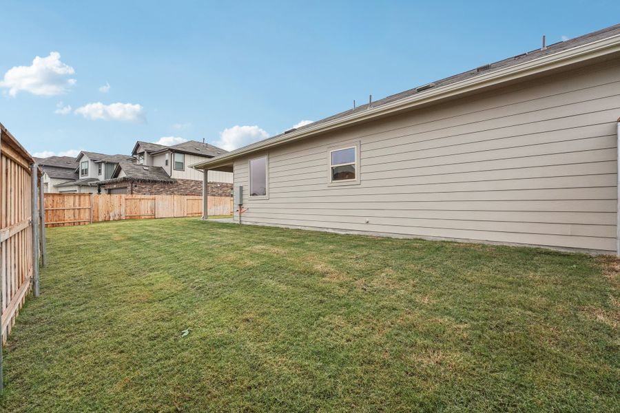 Exterior details and patio area of a home in Crosswinds, Kyle (Image 20). Exterior details and patio area of a home in Crosswinds, Kyle (Image 20).