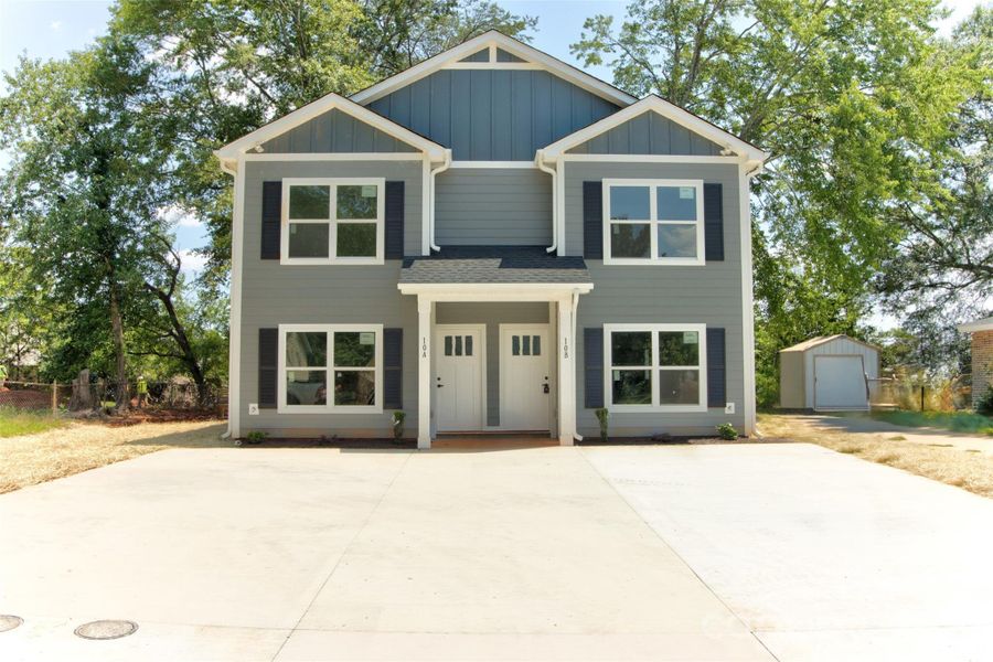 Front exterior of a new home in , Hickory, NC, highlighting curb appeal (Image 1). Front exterior of a new home in , Hickory, NC, highlighting curb appeal (Image 1).