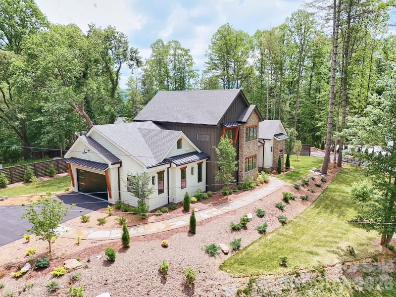 Front exterior of a new home in , Brevard, NC, highlighting curb appeal (Image 26).