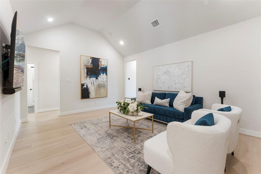 Upstairs loft offers another flexible lounge area for movie nights, studying, or quiet downtime. It gives the home multiple living zones so family members can spread out comfortably.
