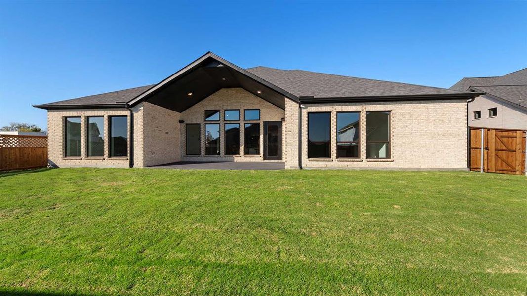 Exterior details and patio area of a home in Somerset Park 80', Rockwall (Image 2). Exterior details and patio area of a home in Somerset Park 80', Rockwall (Image 2).