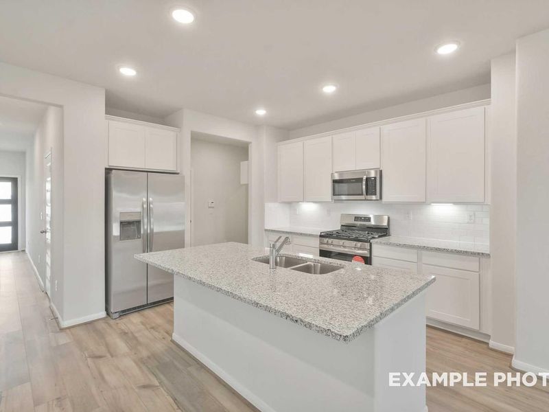 Furnished interior view inside a new home in Caney Creek Place, Conroe (Image 3).