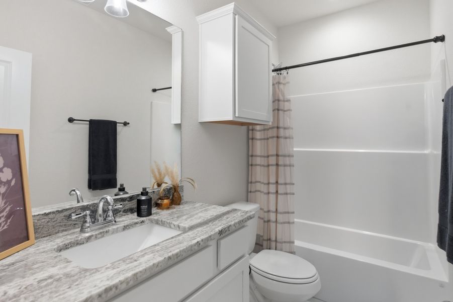 Furnished interior view inside a new home in Bonham Trace, Bryan (Image 5).