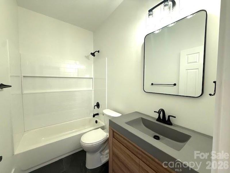 Furnished interior view inside a new home in , Concord (Image 12).