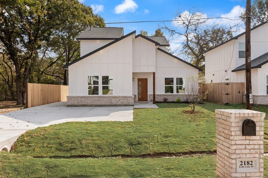 Front exterior of a new home in , Dallas, TX, highlighting curb appeal (Image 29).