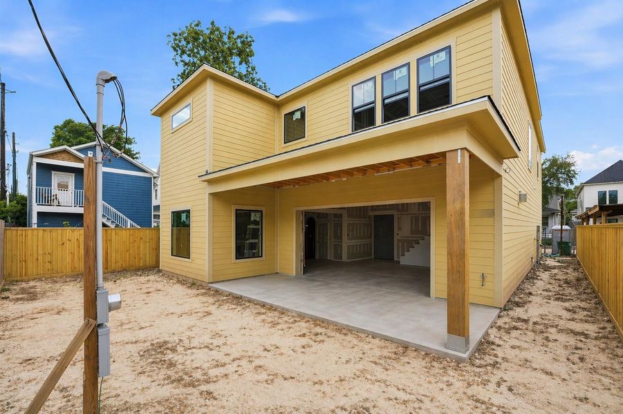 The inviting 10 ft x 26 ft covered patio is pre-plumbed for an outdoor kitchen.