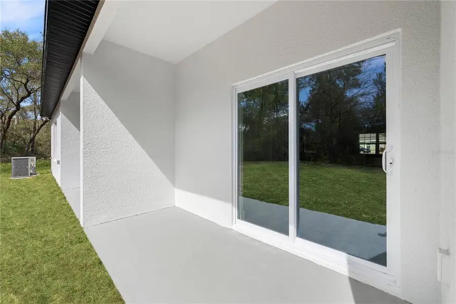 Exterior details and patio area of a home in , Ocala (Image 3).