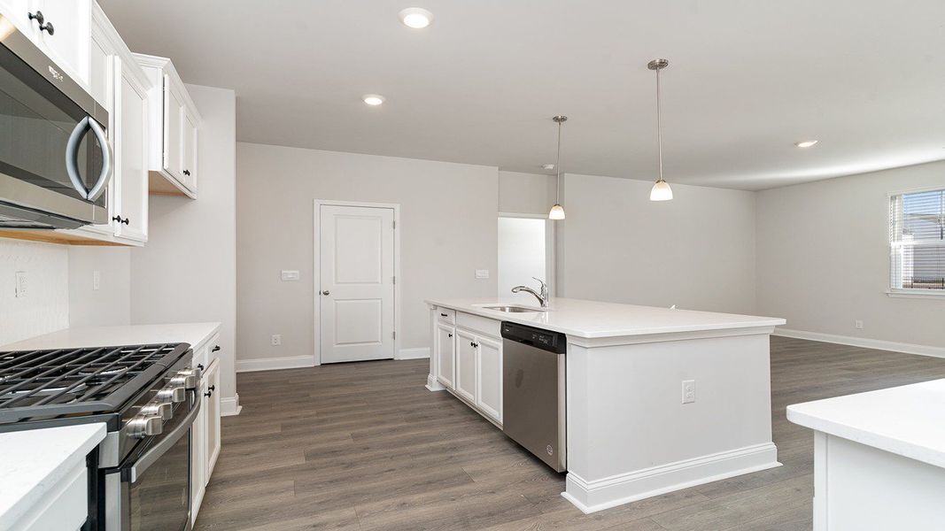 Representative furnished interior of a home built from the Belfort by D.R. Horton in Heron Pointe, Myrtle Beach (Image 9).