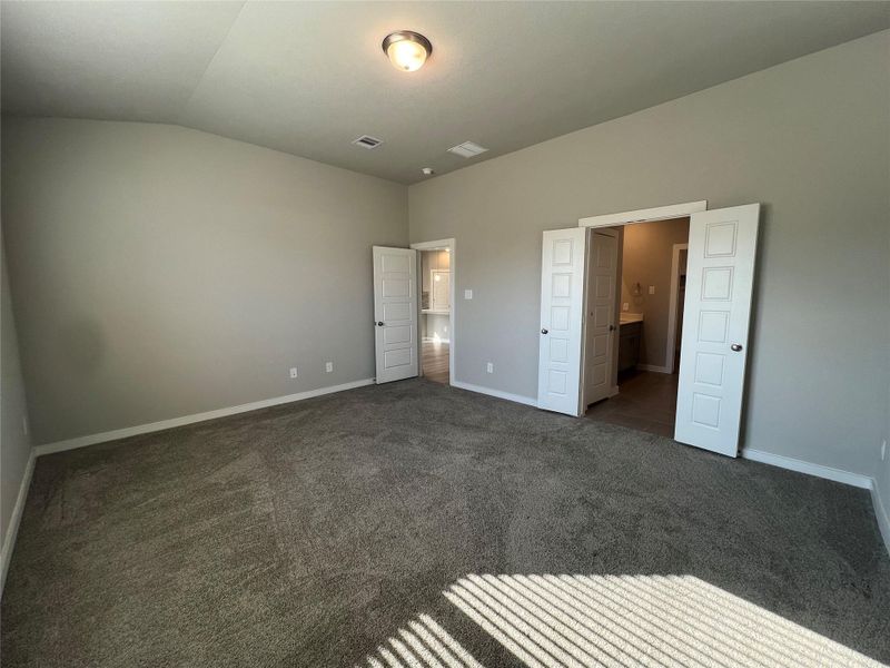 spacious primary bedroom