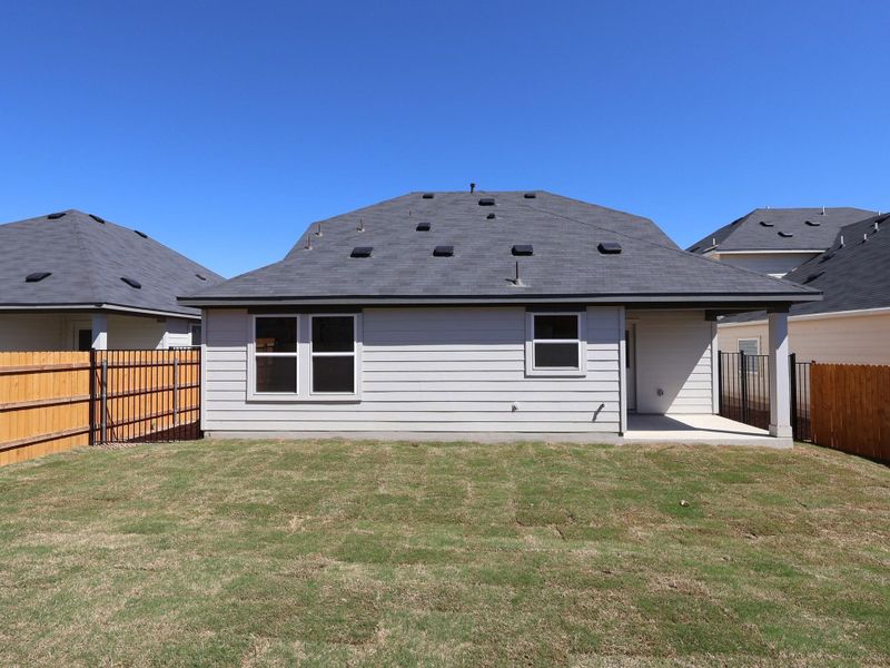 Exterior details and patio area of a home in Cascades at Onion Creek, Austin (Image 3).