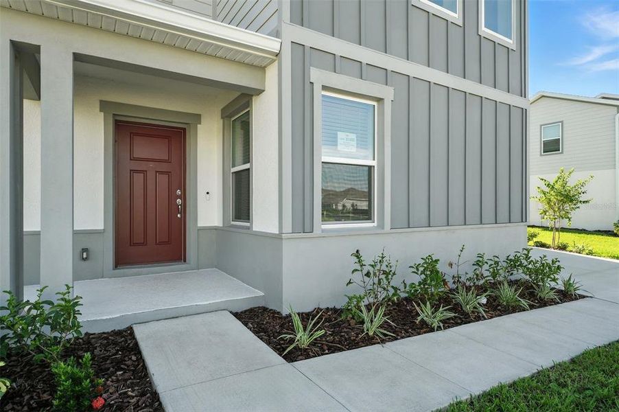 Exterior details and patio area of a home in Amelia Groves, St. Cloud (Image 23).