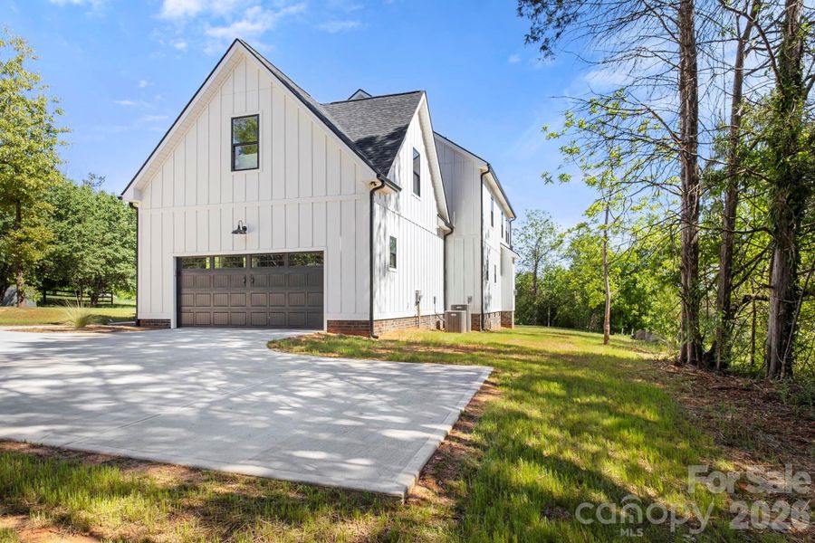 Front exterior of a new home in , Denver, NC, highlighting curb appeal (Image 26).